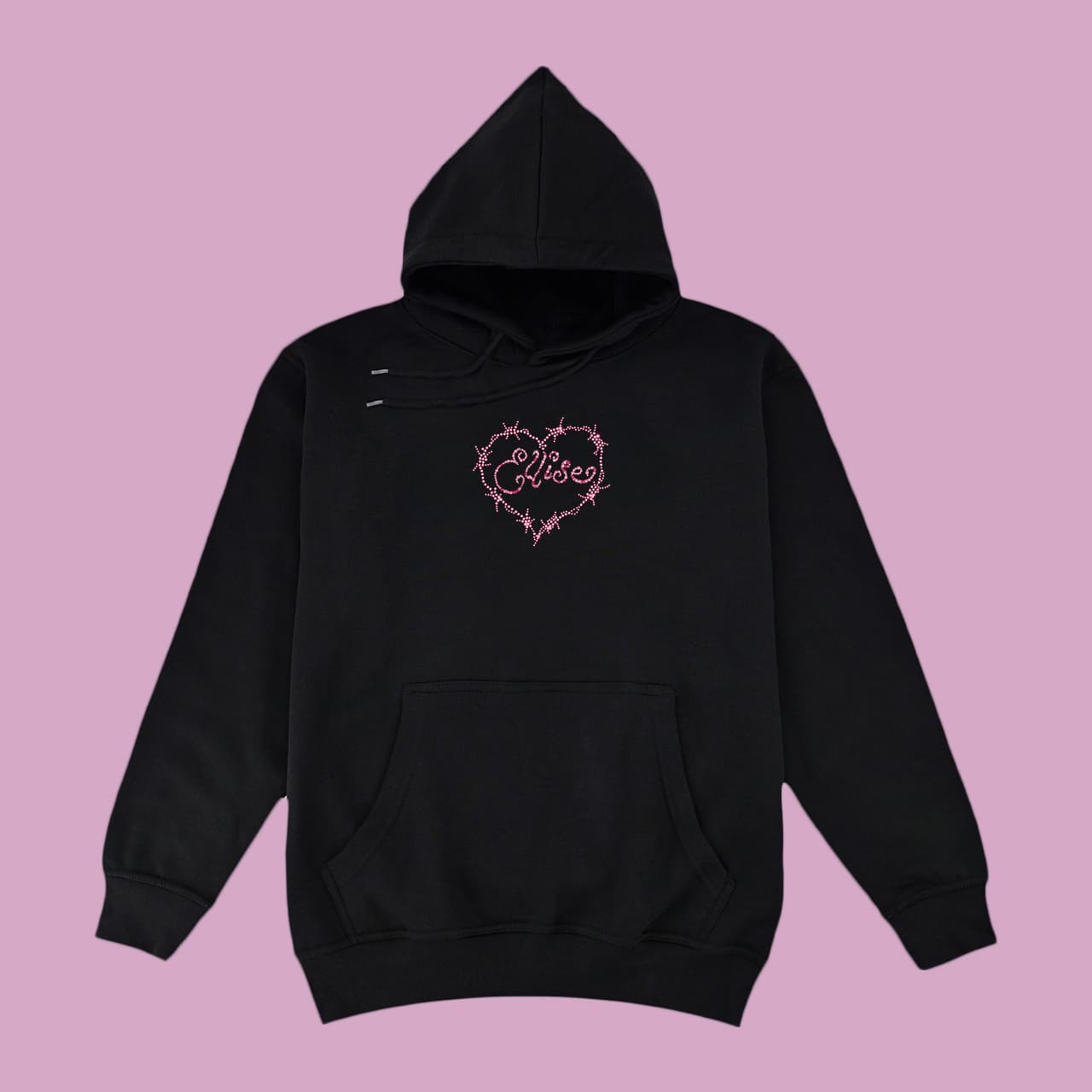 A black pullover hoodie with a pink thorny heart graphic containing the text 'Ellise' on the chest, displayed against a solid pink background.